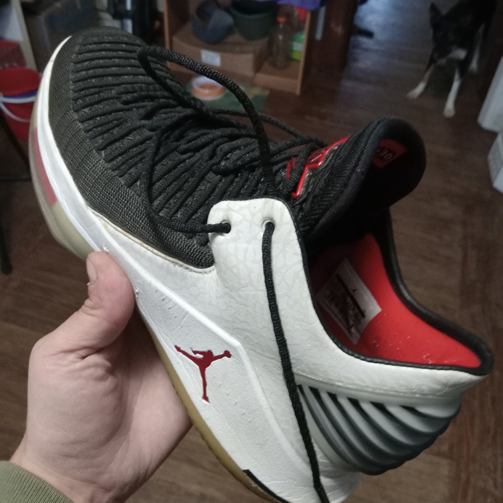 Black and White Athletic Shoes with Red Accents